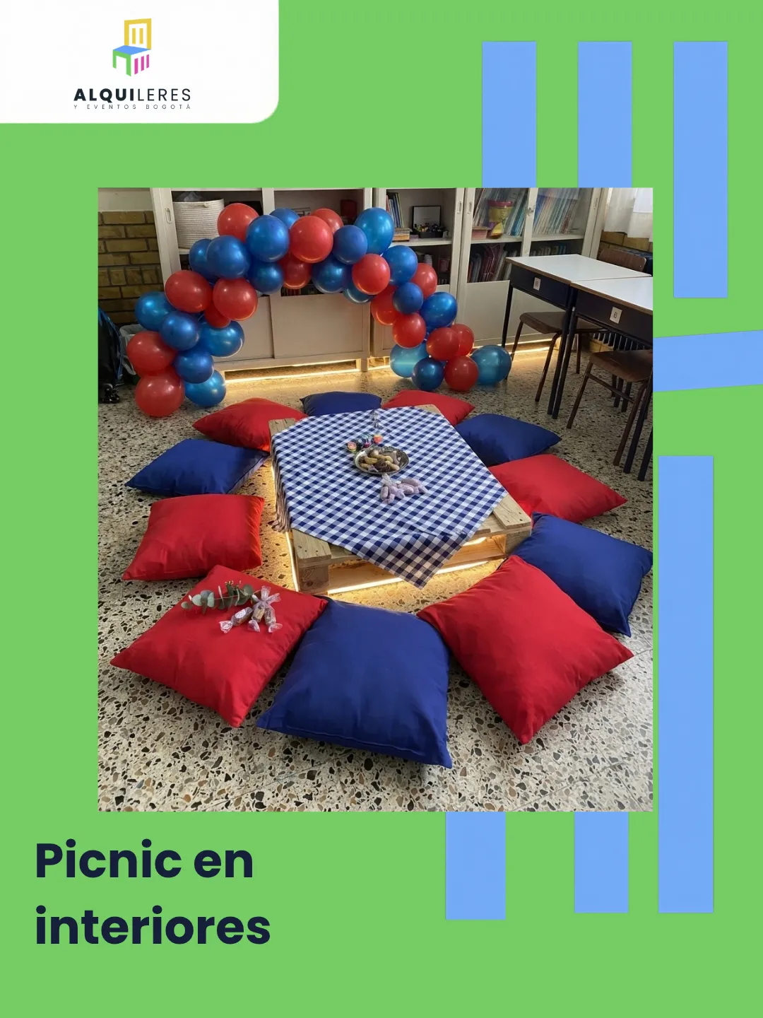 Picnic en interiores con estiba, mantel de cuadros azules y cojines rojos y azules
