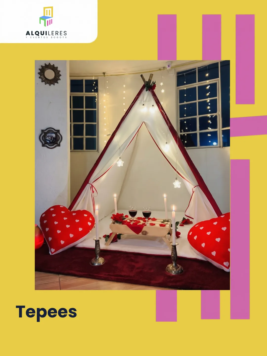 Tipi blanco con borde rojo, cojines de corazón, velas y mesa baja para cena romántica
